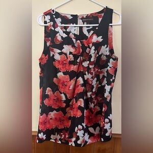 DANA BUCHMAN size MEDIUM, black with red floral print, sleeveless top.
